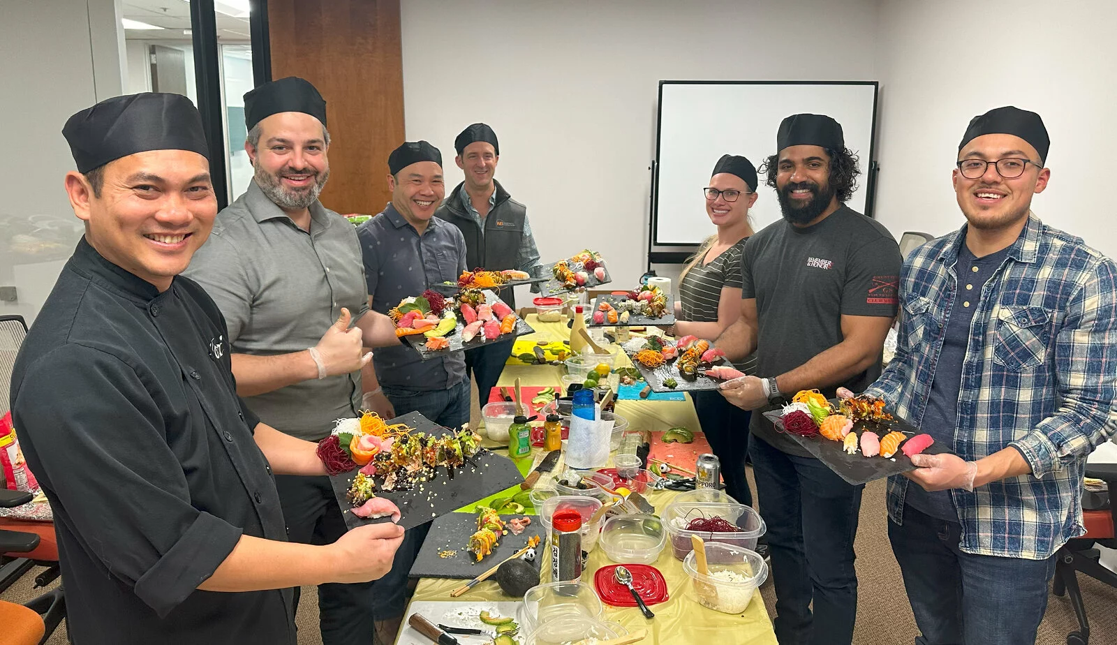 Our Bay Area office made fresh sushi during lunch one day (it was delicious!). 2023/07/Bay-Area-Sushi-Making-with-Jak.jpg 