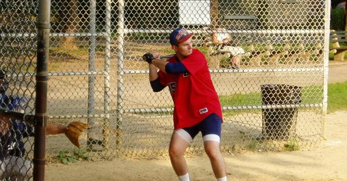 Peter DeBernardo playing softball